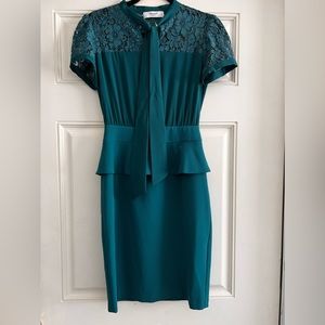 Designer BLUMARINE peplum short dress. Never been worn like new.